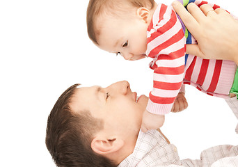 Image showing happy father with adorable baby