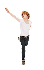 Image showing jumping man in  white shirt