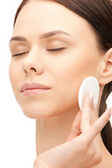 Image showing beautiful woman with cotton pad