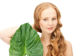 Image showing woman with green leaf