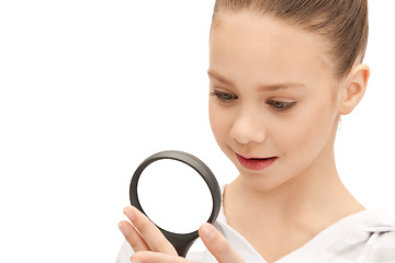 Image showing teenage girl with magnifying glass