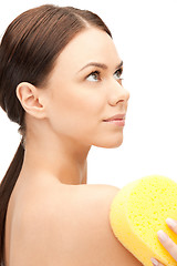 Image showing beautiful woman with sponge