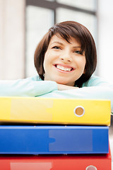 Image showing woman with folders