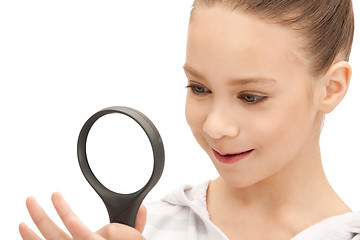 Image showing teenage girl with magnifying glass