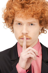 Image showing finger on lips