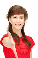Image showing teenage girl with an open hand ready for handshake