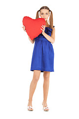 Image showing lovely woman with red heart-shaped pillow