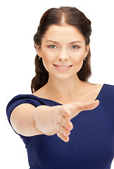 Image showing woman with an open hand ready for handshake