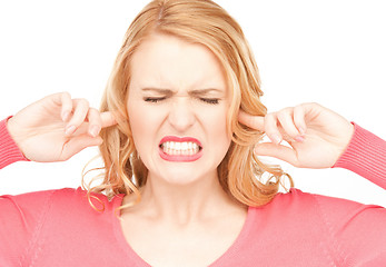 Image showing woman with fingers in ears