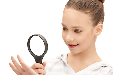 Image showing teenage girl with magnifying glass