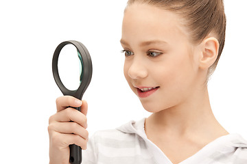 Image showing teenage girl with magnifying glass