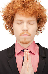 Image showing praying businessman