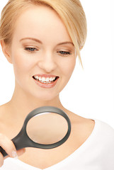 Image showing woman with magnifying glass