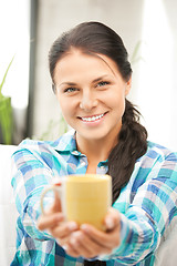 Image showing lovely housewife with mug