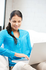 Image showing happy woman with laptop computer