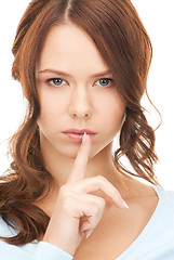 Image showing finger on lips