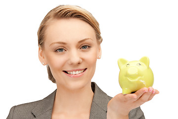 Image showing lovely woman with piggy bank