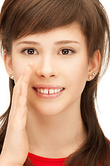 Image showing teenage girl whispering gossip