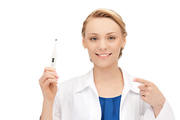 Image showing attractive female doctor with thermometer