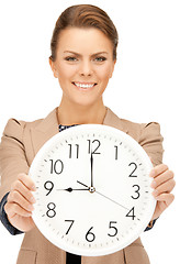 Image showing woman holding big clock