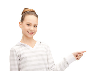 Image showing teenage girl pointing her finger