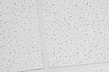 Image showing Surface of white perforated ceiling panel: abstract background