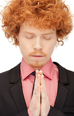 Image showing praying businessman