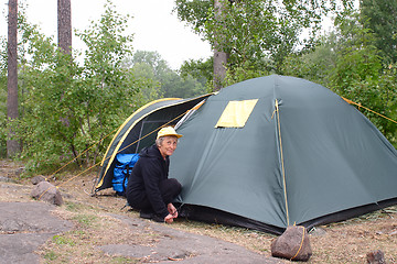 Image showing Elderly woman in camping