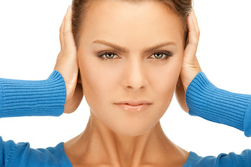 Image showing woman with hands on ears