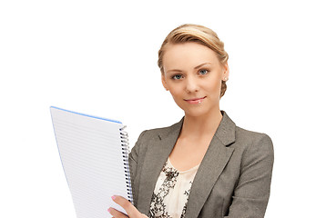 Image showing calm woman with big notepad