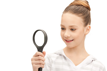 Image showing teenage girl with magnifying glass