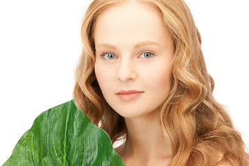 Image showing woman with green leaf