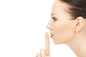 Image showing finger on lips