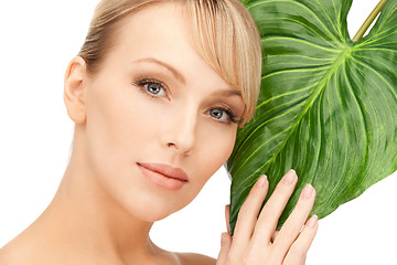 Image showing woman with green leaf