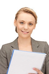 Image showing happy woman with big notepad