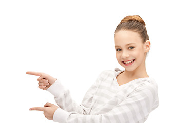 Image showing teenage girl pointing her finger