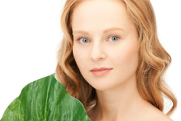 Image showing woman with green leaf