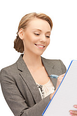 Image showing happy woman with big notepad