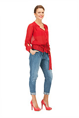 Image showing lovely woman in red blouse and jeans