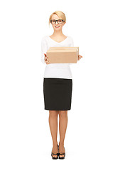 Image showing attractive businesswoman with cardboard box