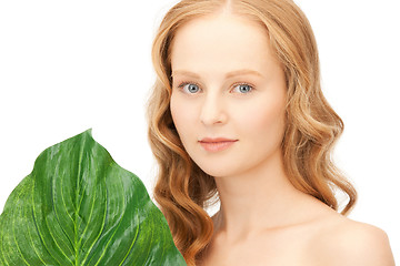 Image showing woman with green leaf