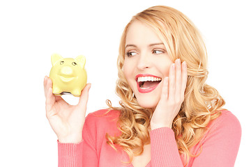 Image showing lovely woman with piggy bank