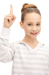 Image showing teenage girl with her finger up