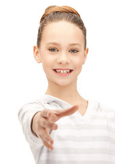 Image showing teenage girl with an open hand ready for handshake