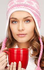 Image showing woman with red mug