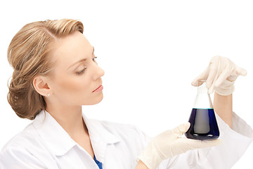 Image showing lab worker holding up test tube