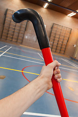 Image showing Hockeystick in an old school gym