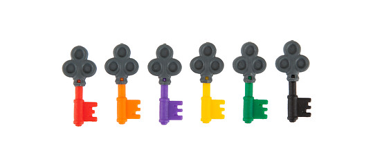 Image showing Six small keys, each with a different color