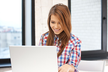 Image showing happy woman with laptop computer