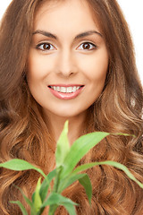 Image showing woman with green sprout